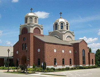 The current church building was constructed in 2006 and is located near College Boulevard and Pflumm Road in Lenexa.